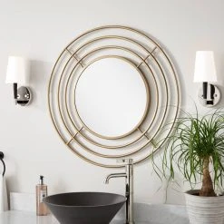 Signature Hardware Reka 30-3/4 x 7/8 in. Round Decorative Vanity Mirror in Antique Brass